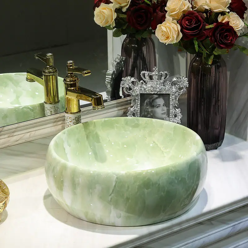On-stage basin Round art marble basin Bathroom washbasin Ceramic washbasin On-stage basin Household