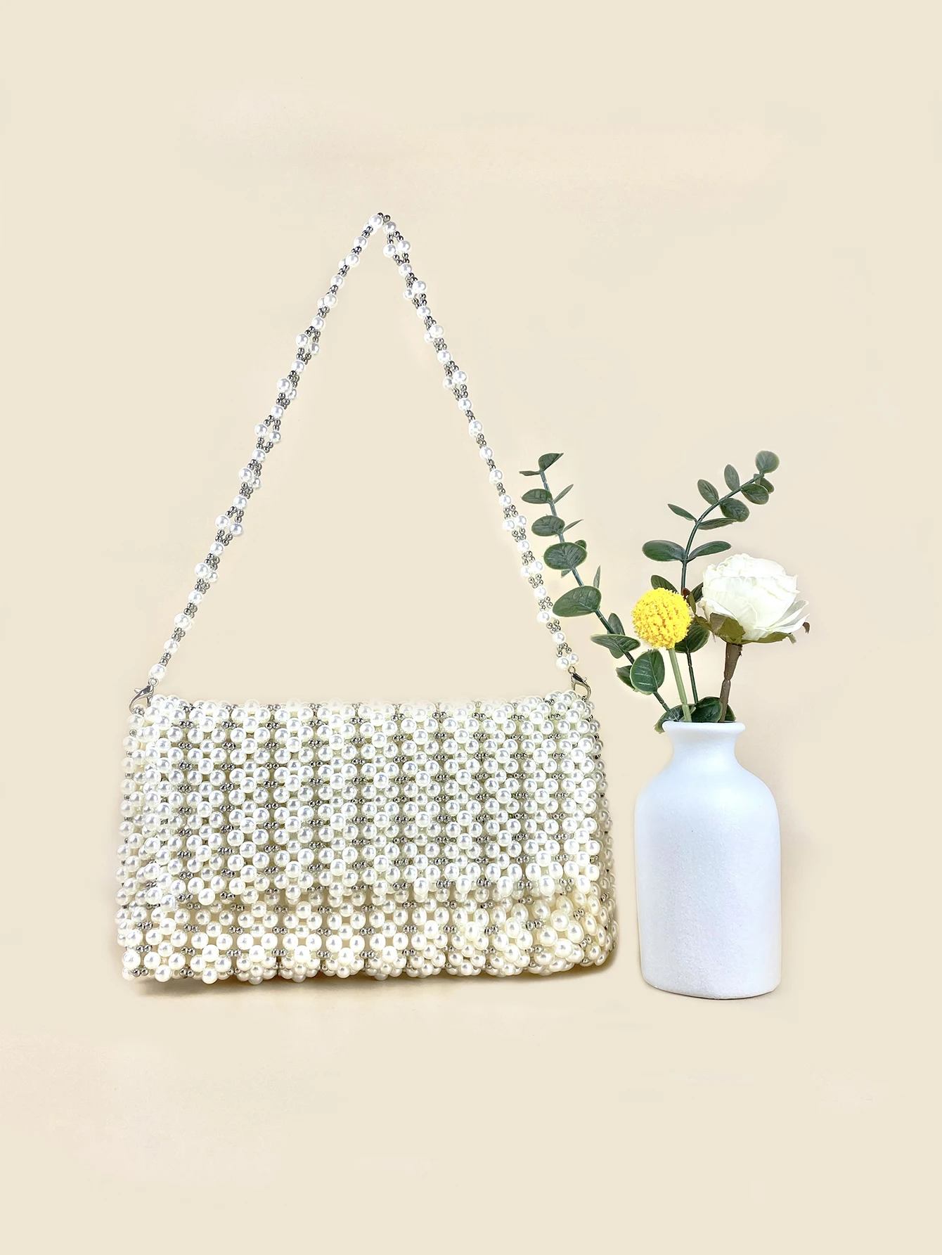 Small and fashionable high-end texture elegant French pearl rhinestone woven beaded hand-held one shoulder banquet bag