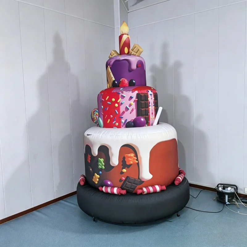 

Inflatable cake with candles, equipped with a fan, advertising birthday party cake air mold