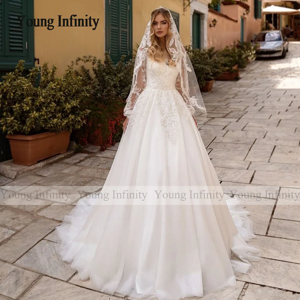 Elegant A Line Long Sleeves Tulle Wedding Dresses 2024 O Neck Beading Crystals Lace Appliques Boho Bridal Gown Vestido De Noiva