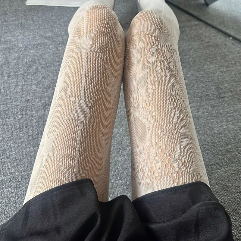 مثير شبكة منقوشة جوارب شبكية الجوف خارج AB تصميم المرأة الجوارب الخماسية نجمة طباعة الشرير سليم الساقين جوارب طويلة من الدانتيل