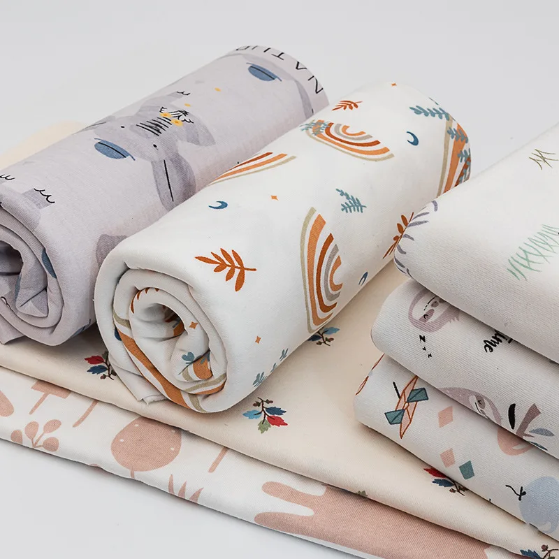 High Quality Soft Pure Cotton Baby Printed Knitted Fabric For Cartoon Baby Clothing Blankets DIY Sewing Fabric 200g/m²