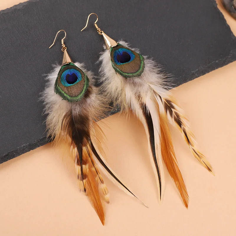 Pendientes de plumas exagerados únicos, pendientes largos de plumas creativas, pendientes grandes bohemios de moda, joyería llamativa para mujer al por mayor