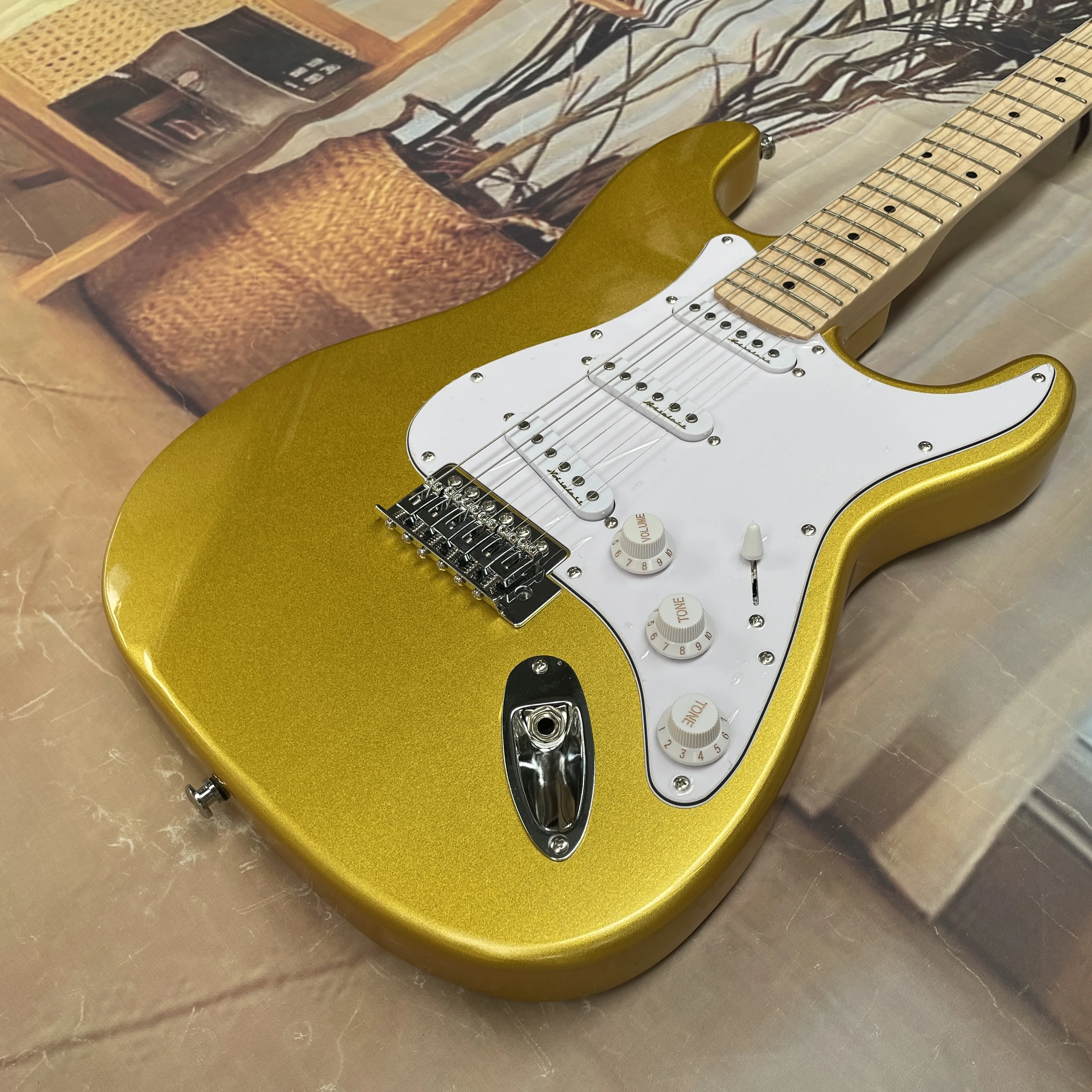 جيتار كهربائي ذهبي اللون بستة  - مراجعة Electric Guitar Beginner وسعره