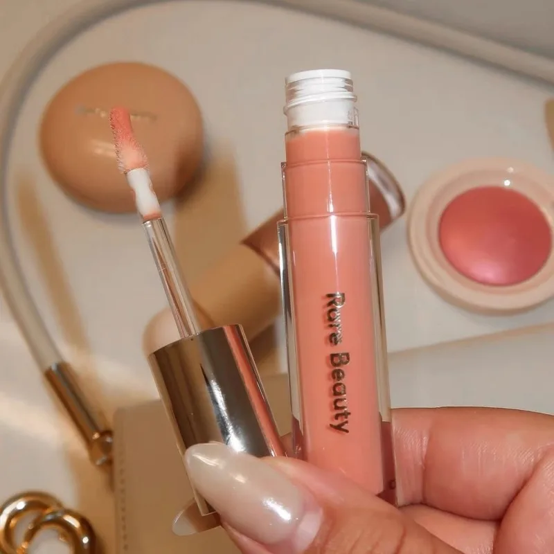 Lucidalabbra Rare Beauty, Volumizzante Non Appiccicoso, Idratante, Migliora le Labbra Secche, Balsamo Labbra Colorato per un Look Labbra Lucido