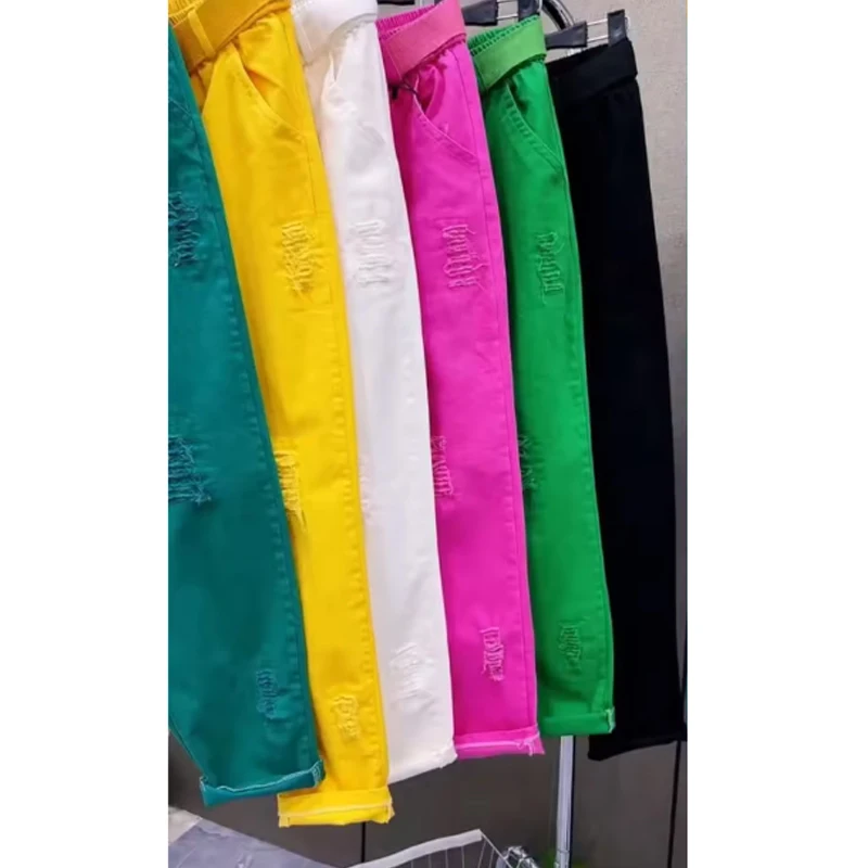 Moda doces cores mulheres jeans primavera outono novo solto denim harem calças de cintura alta buraco calças casuais feminino
