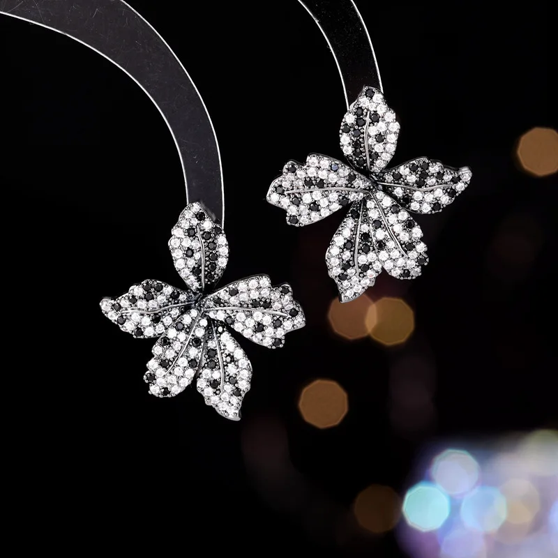 

Zircon flower leaf earrings for Women s925 silver needle cold style stud earrings are niche and versatile earrings