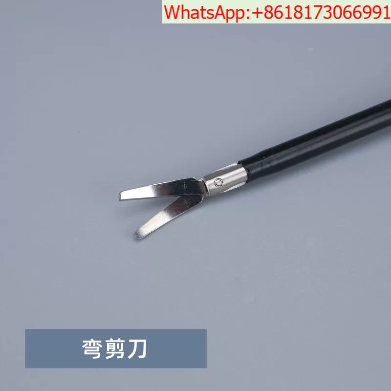 Laparoscopic simulation training instruments: needle holder, fenestrated grasper, curved scissors, and dissector.