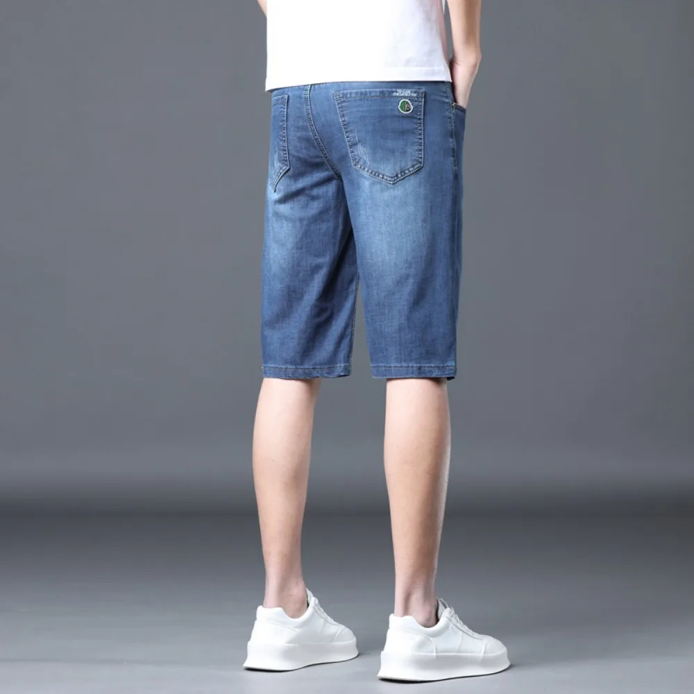 2024 New denim shorts for men's summer  new  loose straight leg knee length youth elastic cargo jeans  men clothing baggy jeans