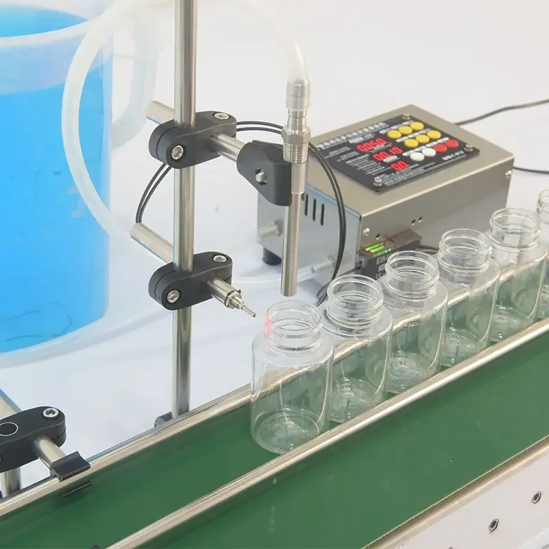 Automatic Conveyor Belt Single Head Liquid Filling Machine High Precision Large Amount Small Bottle Filling Machine