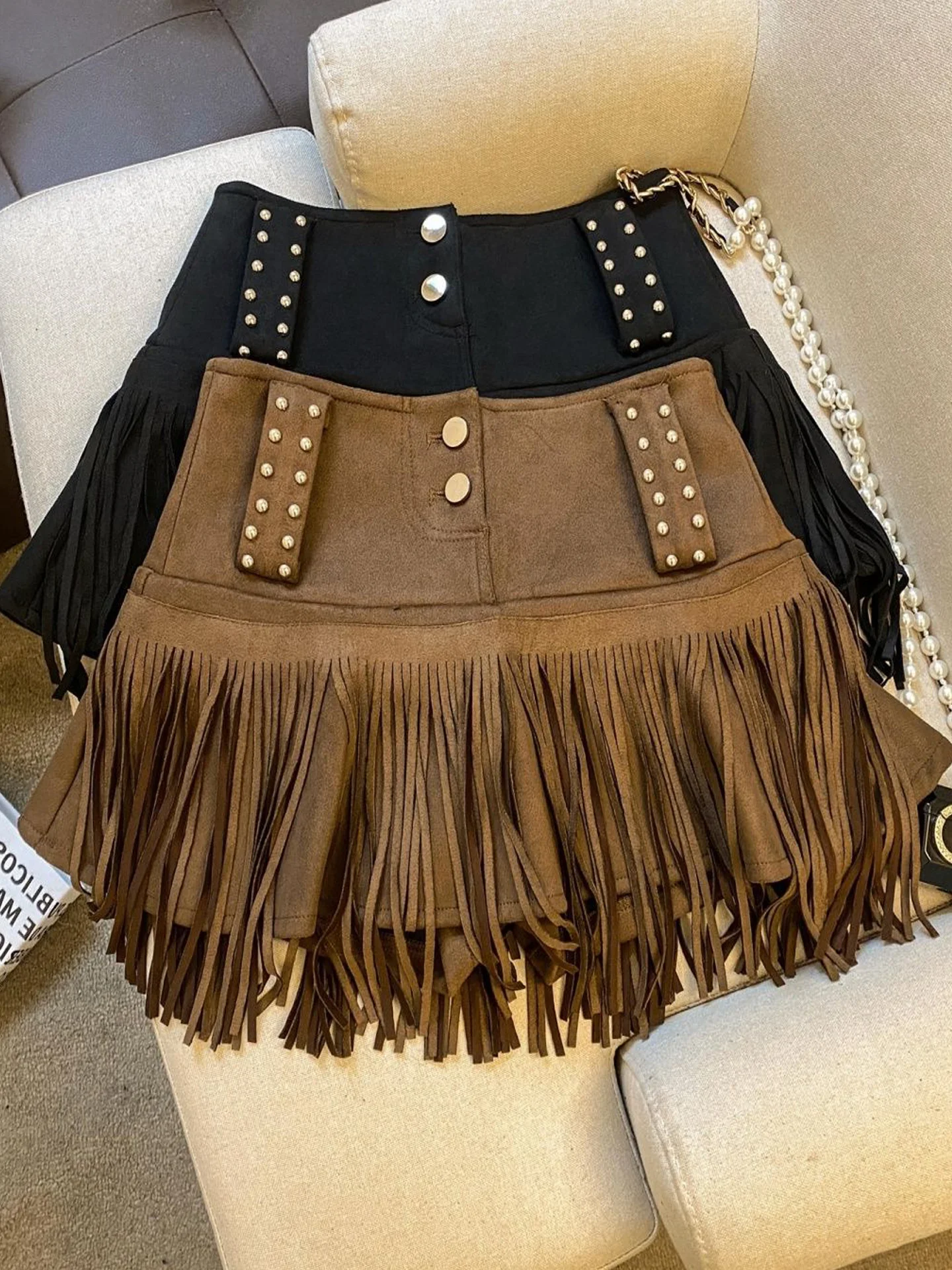 

Новая весенняя женская юбка из оленьего бархата в американском ретро-стиле, с высокой талией, с бахромой, короткая, повседневная, А-силуэт, с защитой от просвечивания