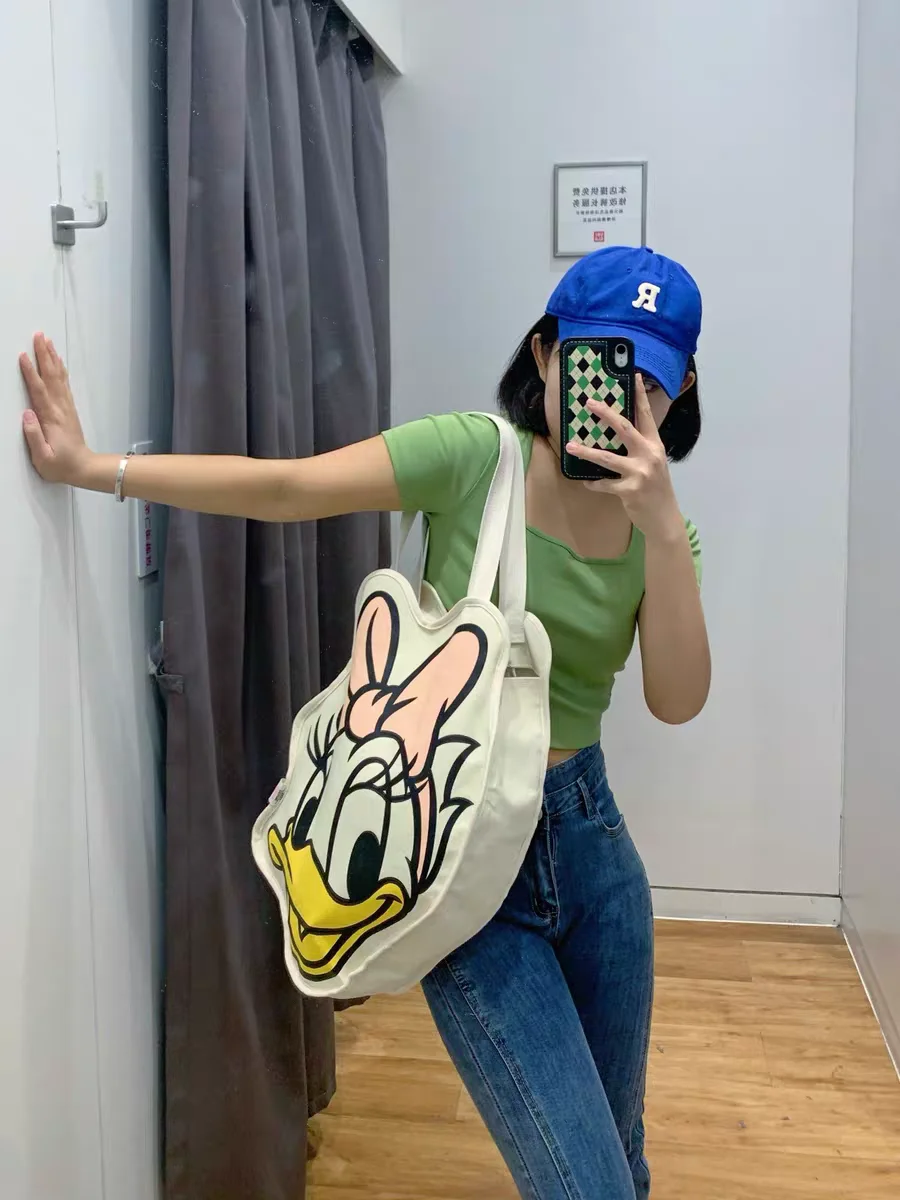 Disney Kawaii Anime Daisy Duck Canvas Cartoon borsa a tracolla per lo Shopping di grande capacità borsa portatile per ragazze di moda regalo di