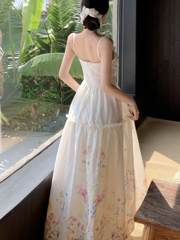 ผู้หญิงปาร์ตี้วันหยุดฤดูร้อนชุดยาวสง่างามสายรัดปาเก็ตตี้เก๋แขนกุดพิมพ์ลายดอกไม้วินเทจเดรสวันหยุดชายหาดโบโฮ