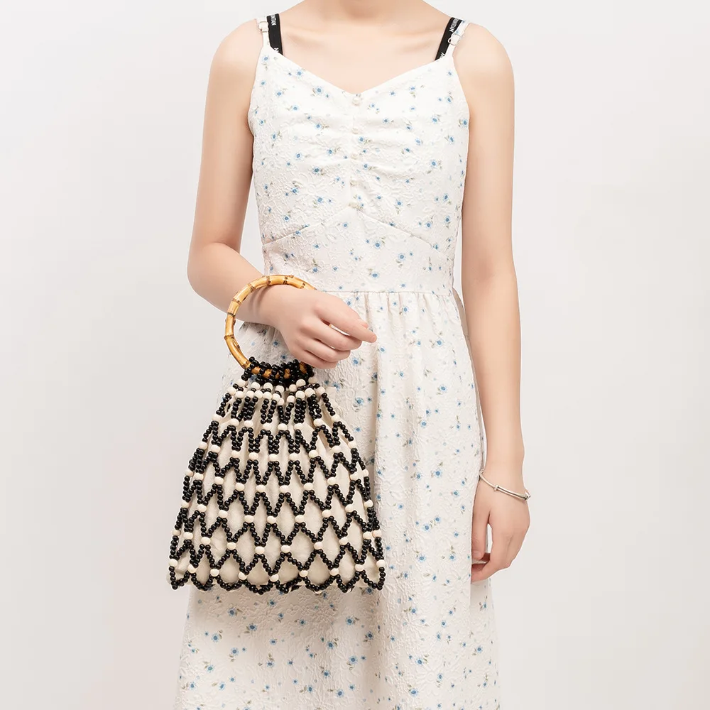 

2025 нишевая бамбуковая женская сумка для пляжного отдыха, деревянная сумка из бисера контрастного цвета, плетение ручной работы, модная и элегантная