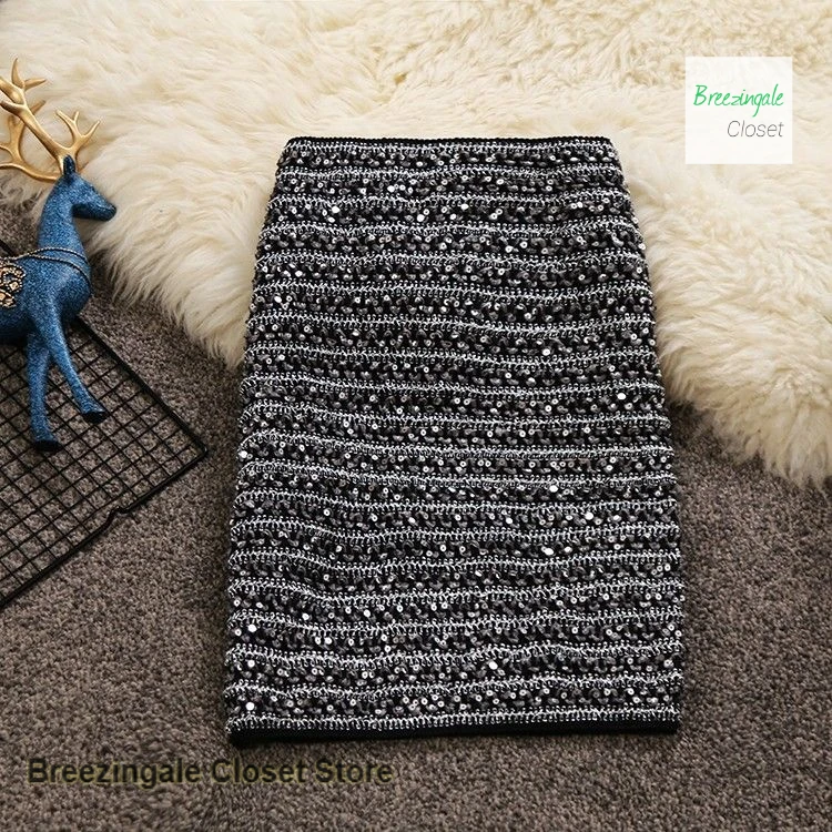 

Korean style sexy bright silk high waist skirt hip skirt female autumn and winter new fashion tight casual bag hip skirt.