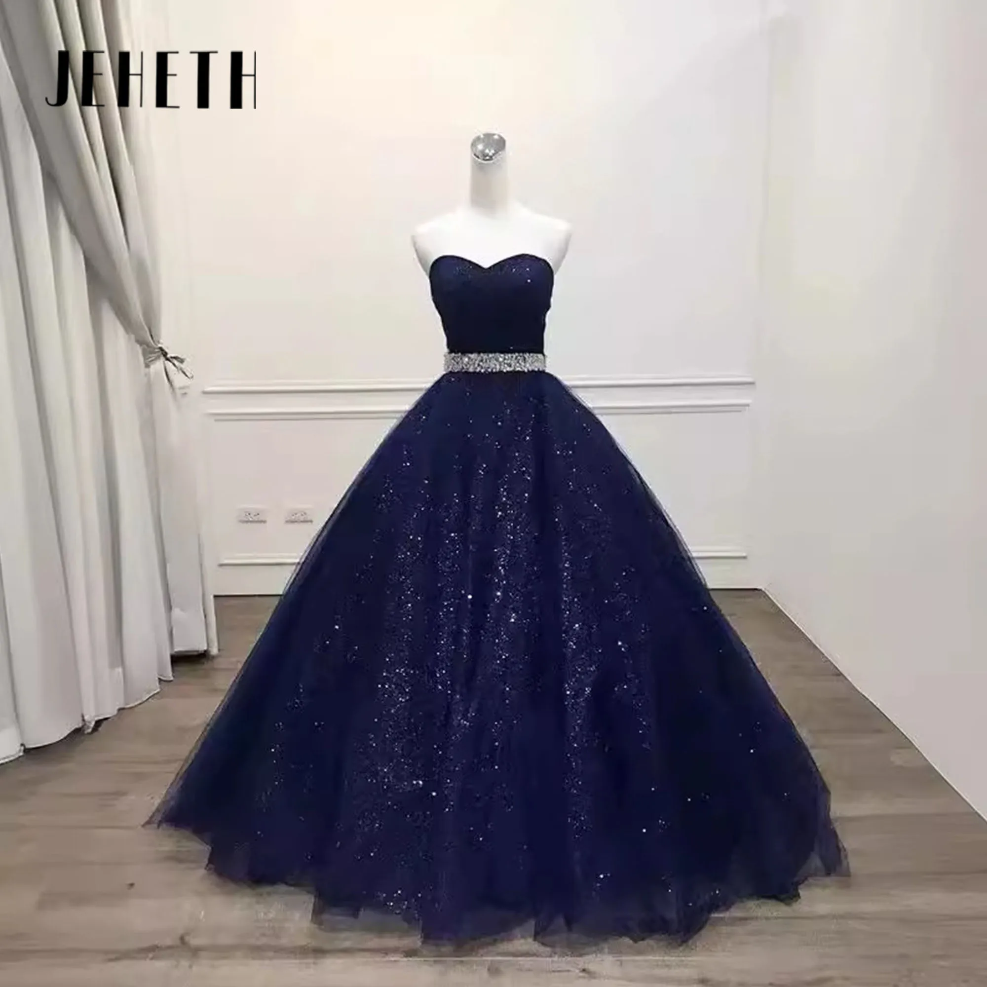 

JEHETH Sweetheart Navy Blue Ball Gown Luxury Shiny Glitter Tulle Evening Dress Floor Length Masquerade Beading Sash Evening Gown