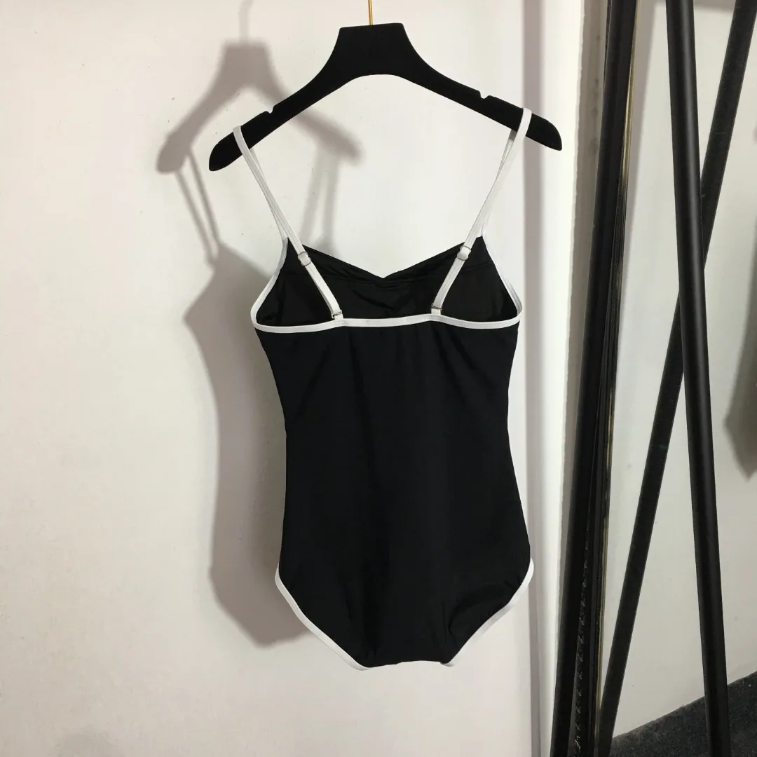 Sexy One-Piece Swimsuit with Diamond Logo Decoration Simple Retro Black and White Color Matching Sexy Leaky Back Beach Bikini