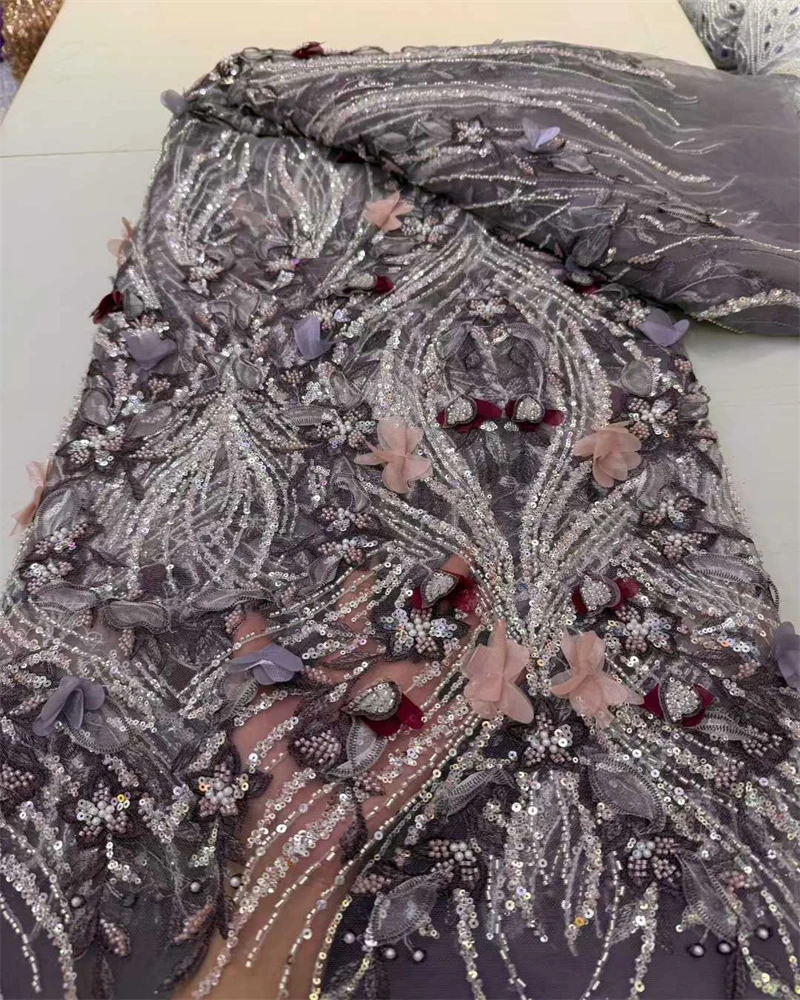 Tessuto africano del pizzo dello sposo in rilievo 2025 Tessuto di pizzo francese di maglia di alta qualità Paillettes Tessuti di pizzo nigeriano per abito da sposa cucire