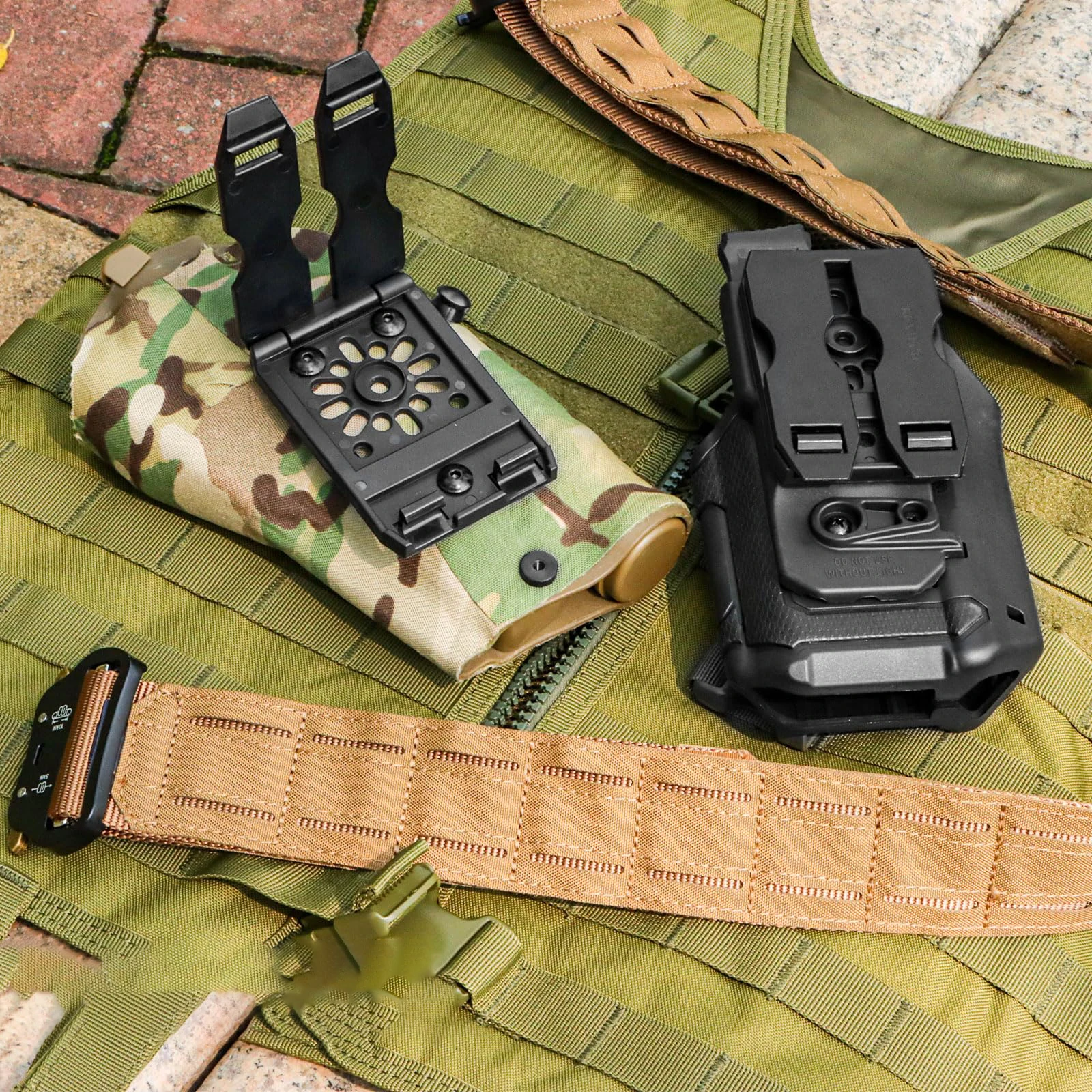 Molle adapter clip, a versatile polymer modular accessory for holsters/magazine pouches, suitable for Molle belts and vests.