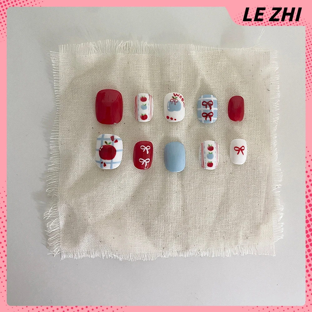 لطيف قصيرة الأظافر كاذبة الوردي الكرز القوس الجناح ندفة الثلج القوس تصميم رسمت باليد الزهور اللؤلؤ الحيوانات الأظافر كاذبة مخصصة