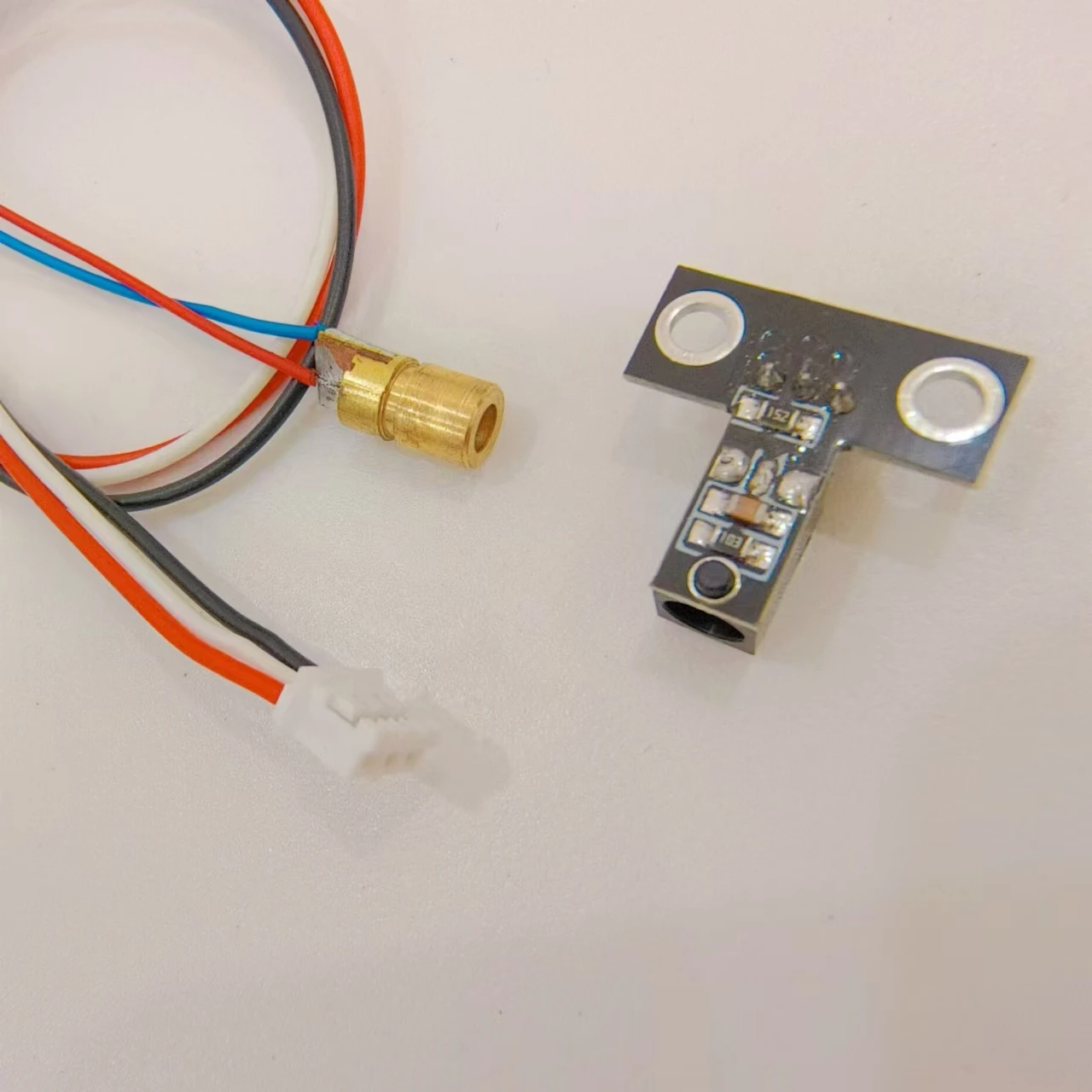 La alarma superior del sensor del detector láser del punto DC5V detecta la distancia máxima 10m