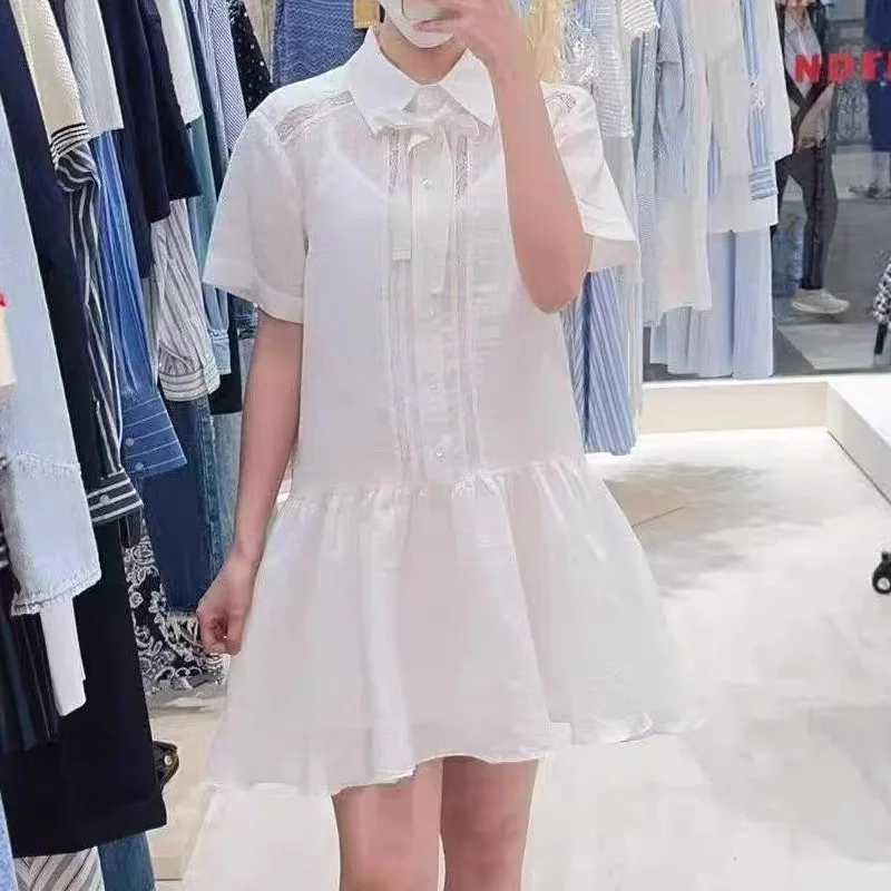 Abito da donna bianco con volant e abito camicia elegante slim fit con fiocco