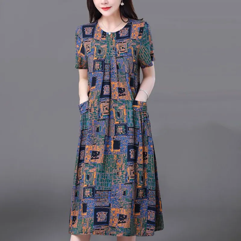 

Commute Vintage Printed Dresses 2024 Summer Short Sleeve Women's Clothing Casual Round Neck Fashion Pockets Patchwork Midi Dress