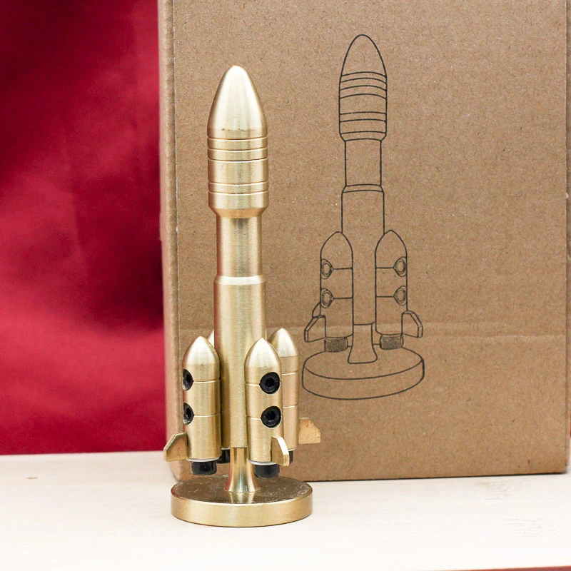 Brass rocket stress-relief toy that soars into the air, desktop ornament, metal craft, rotatable fidget piece, lighter