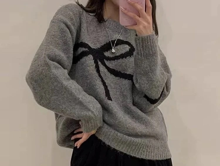 2025 ربيع جديد طويل الأكمام محبوك قميص المرأة فضفاضة القوس الكتف مقنعين سترة أعلى