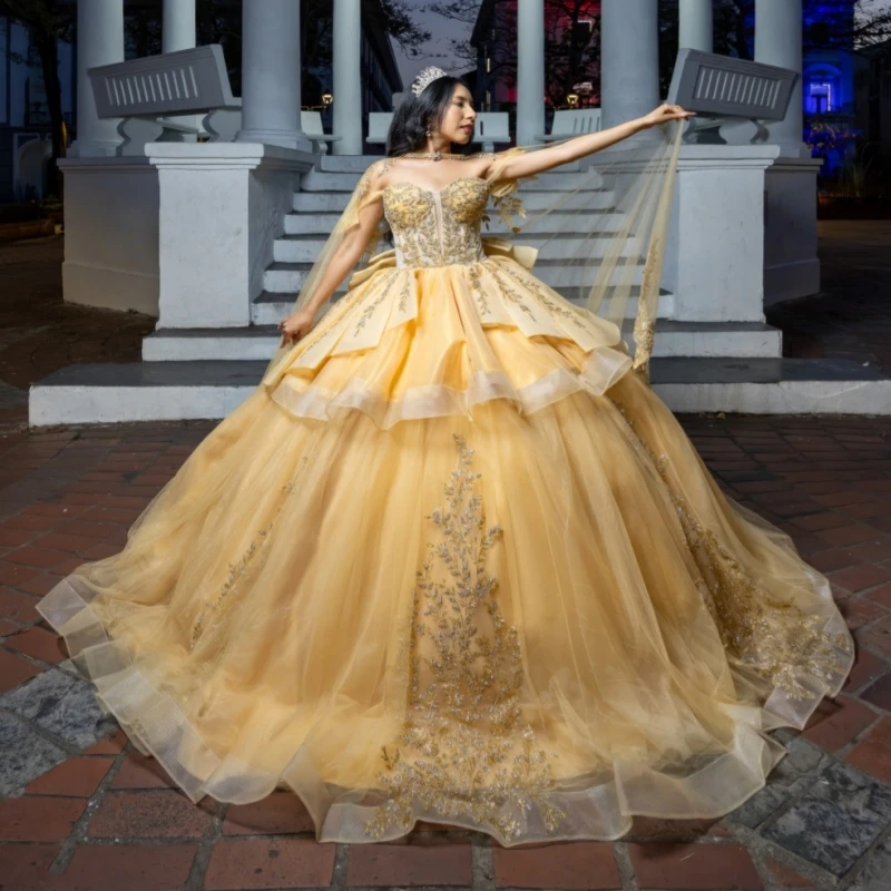 

Champagne Shiny Ball Gown Quinceanera Dresses Applique Lace Beading Crystal Bow With Cape Tull Corset Off Shoulder Sweet 16 Dres