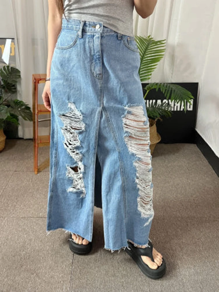 

Women's design, commuting temperament, spring and summer brushed, perforated tassel, frayed edge, split mid length denim skirt