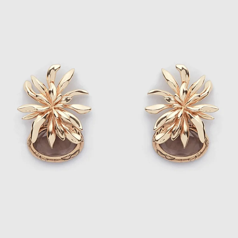 

Plant and flower earrings are delicate in texture