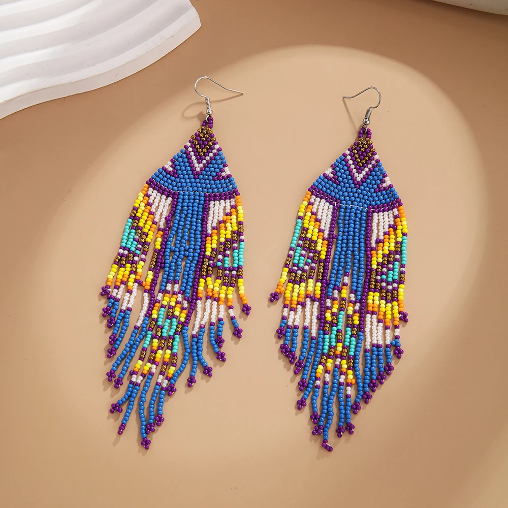 Rice bead earrings Tassel Fashion Simple Design Bohemia Hand knitting Alloy Geometry Beaded earrings