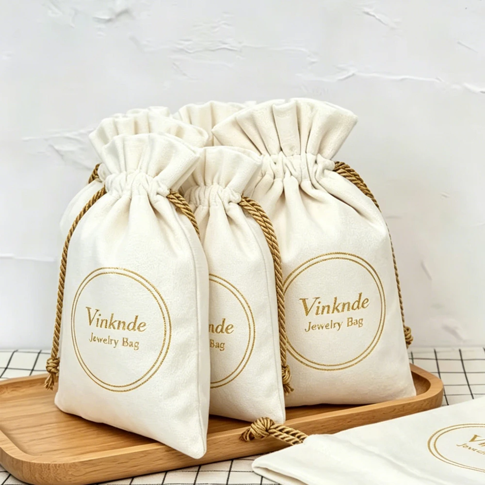 

100Pcs Custom Logo Beige Velvet Drawstring Pouches Luxury Cosmetic Keychina Jewelry Packing Bags Earrings Oil Dust Velvet Bags