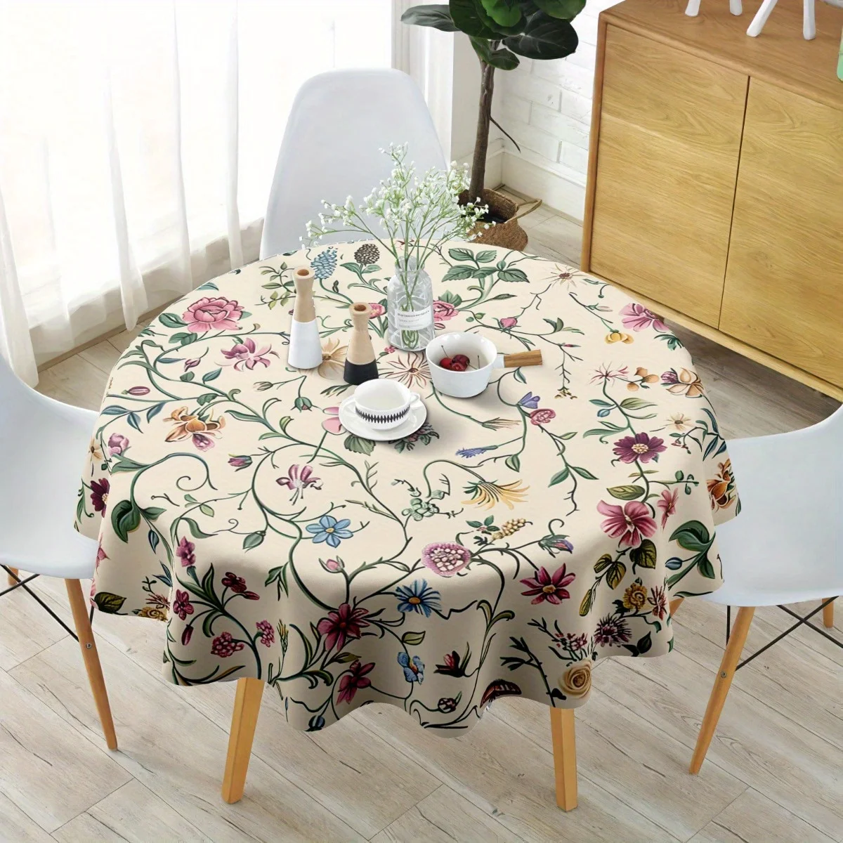 One round and rectangular/elliptical tablecloth suitable for circular dining tables made of polyester fabric