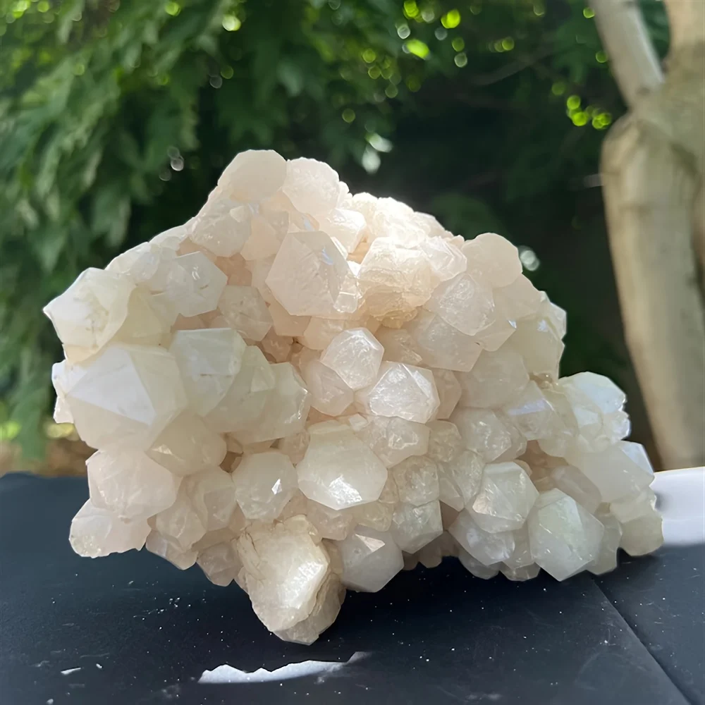 A beautiful transparent quartz ornament—a cluster of white quartz crystals with a yellow base—suitable for office decoration