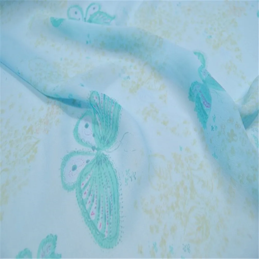 Popular Light Blue Color Soft Pure Silk Georgette Tecido com Borboleta Impresso para Lady Vestido Gracioso