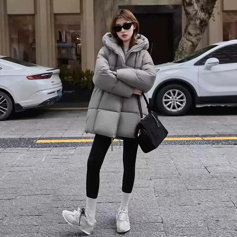 2025 invierno nuevo abrigo cálido para mujer Chaqueta larga de algodón con plumón moda con capucha mujer acolchado suelto Be All-Match ropa de abrigo de pan