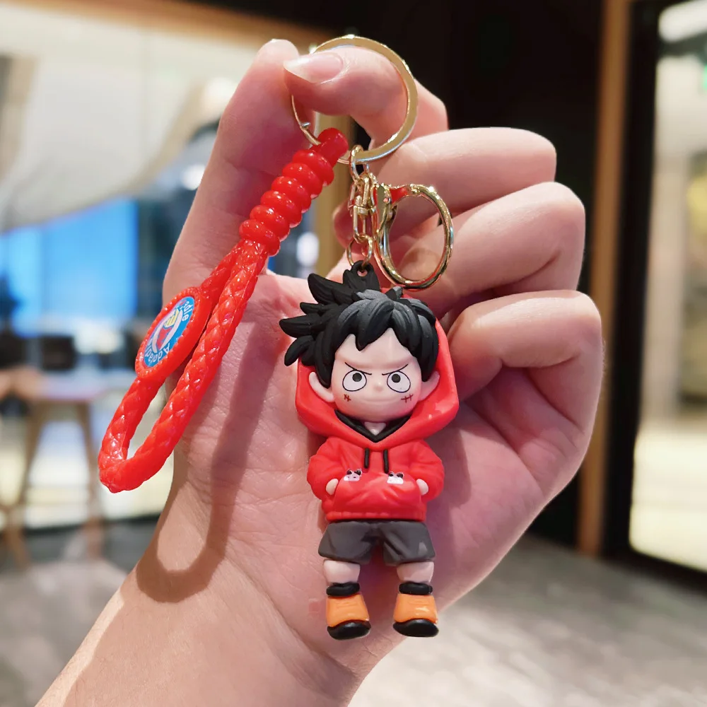قطعة واحدة من Dragon Ball تحمل مفتاح Luffy Solon the Monkey King دمية على ظهره وإكسسوارات قلادة هدايا صغيرة لطيفة للزوجين.