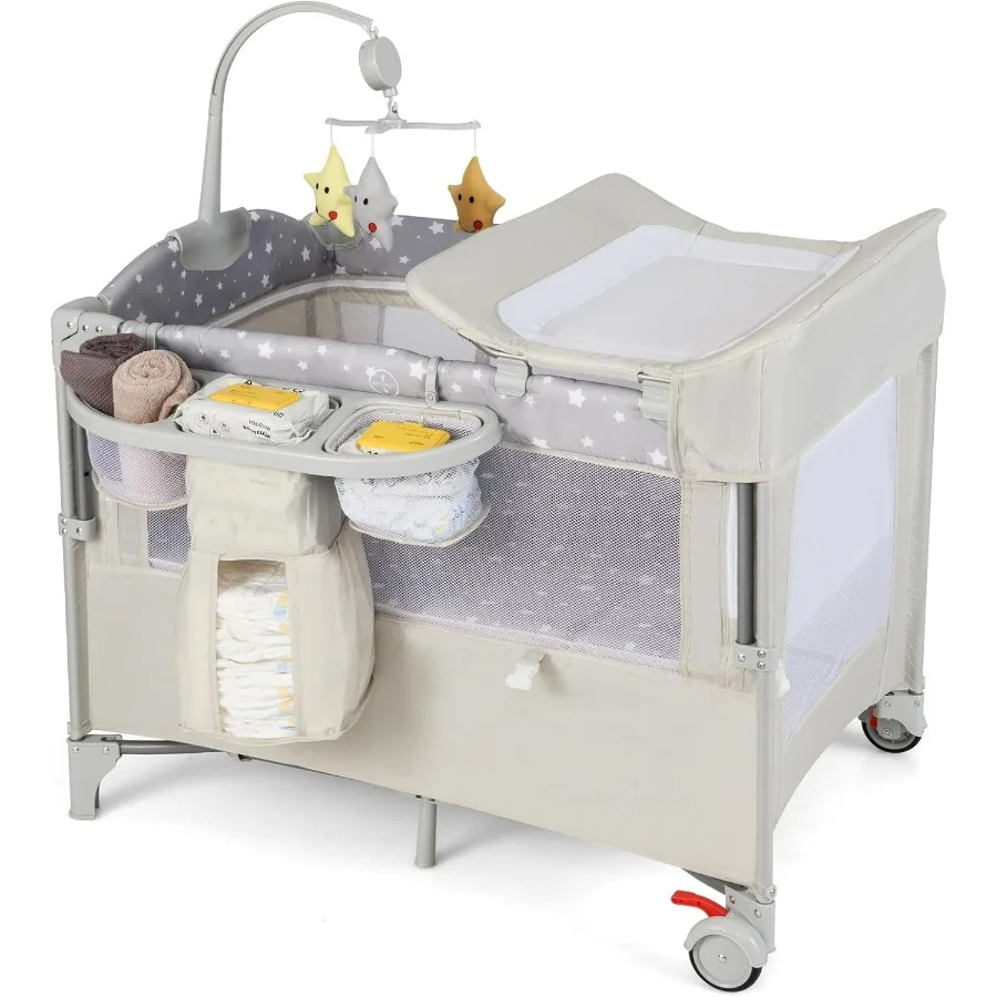 Pack and Play with Bassinet 5in1 Baby Bedside Sleeper w Diaper Changing Table Storage Bag Toy Arch Music Box Detachable Side Ra