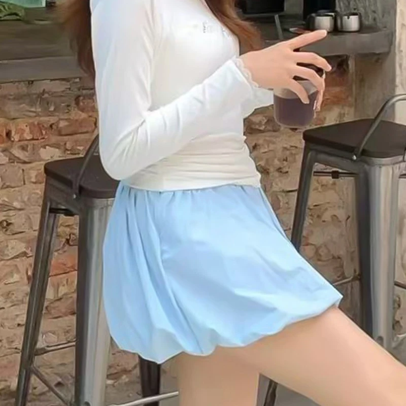 เกาหลีเก๋จีบพัฟกระโปรงมินิกระโปรงผู้หญิง 2025 ฤดูร้อนเอวสูงดอกไม้ Bud กระโปรงสั้นผู้หญิงสีทึบทั้งหมดเค้กกระโปรง