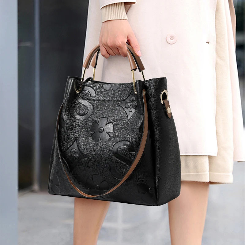 

Stylish Embossed Floral - Letter Pattern Leather Handbag