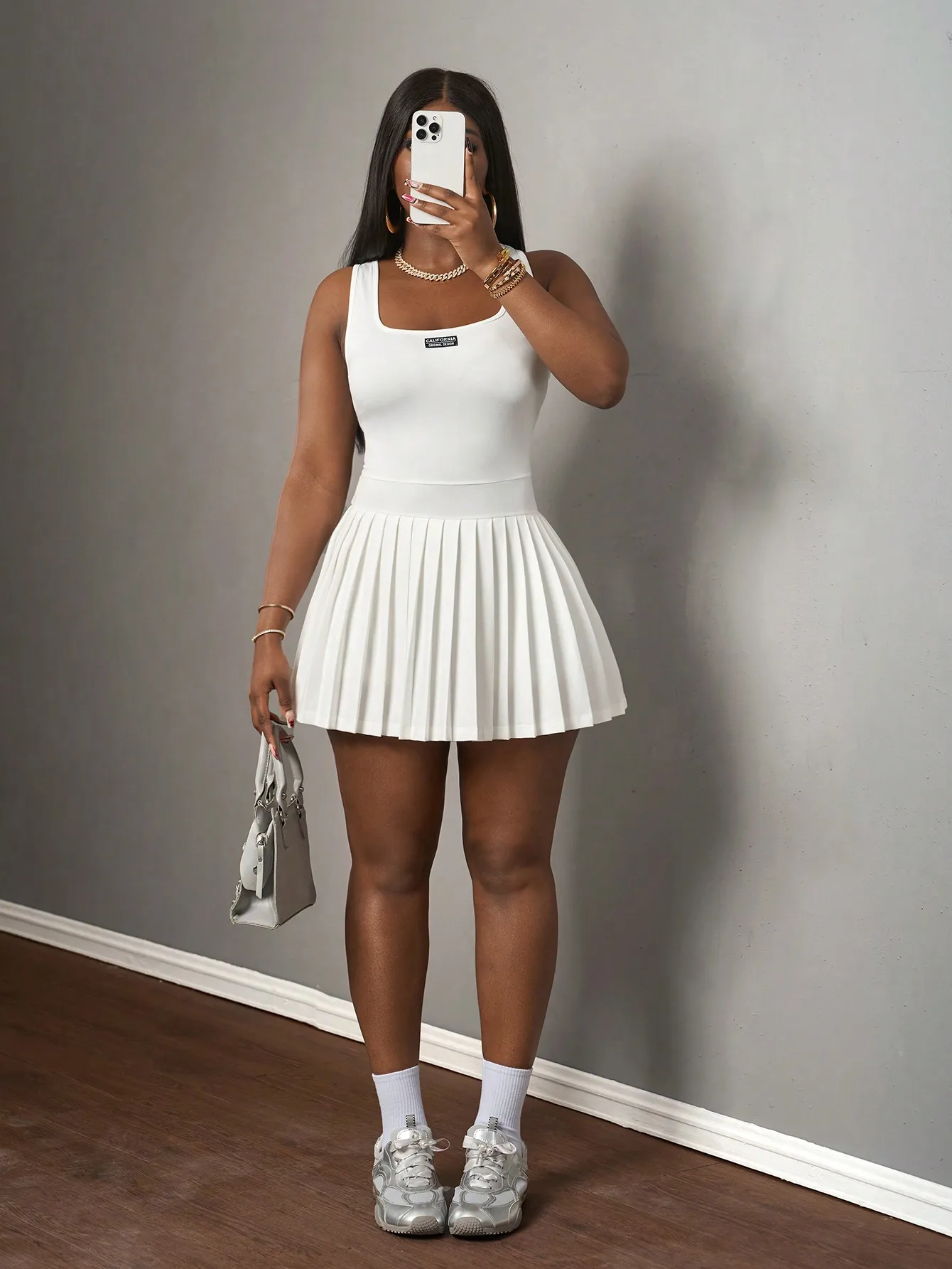 

White Knitted Sleeveless Mini Dress with Pleated Skirt and Square Neck