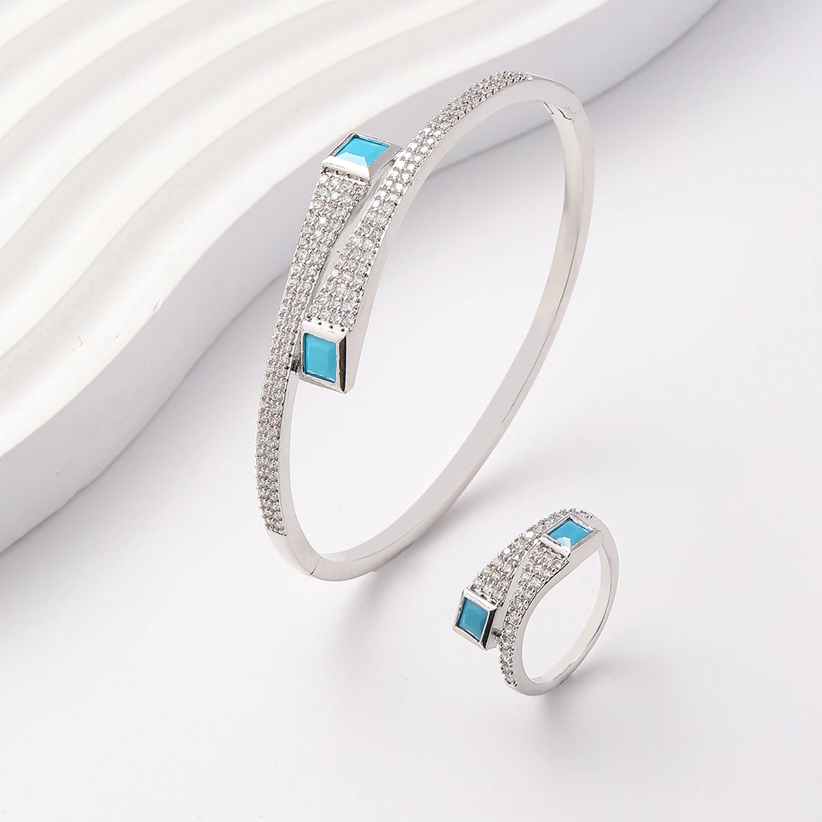 A set of women's new European and American light luxury exquisite trend turquoise zirconium inlaid bracelet ring set