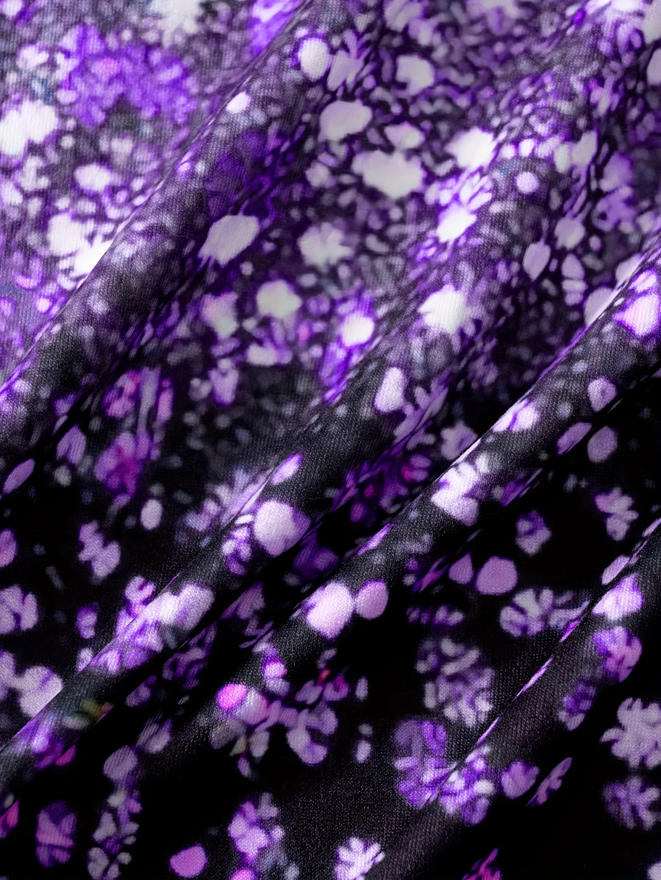 This round neck spaghetti strap maxi dress features a dazzling purple glitter butterfly print on a sleek black base. Soft and fl view 4