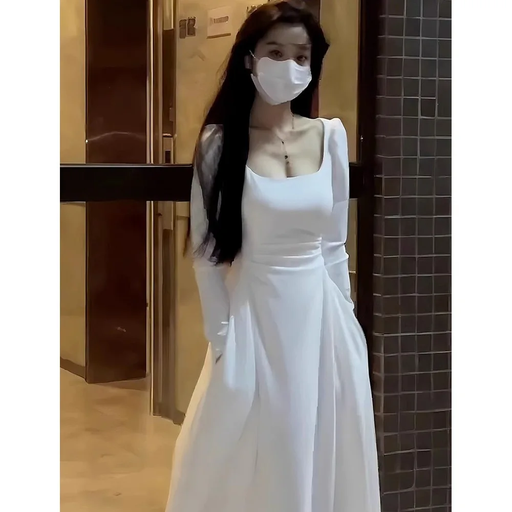 Franse elegantie jurk met lange mouwen en taille-cincerende vierkante hals