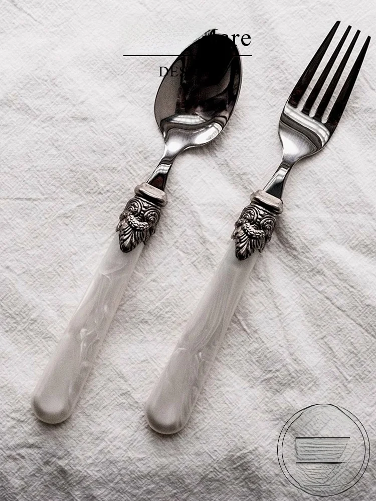 

Nordic Luxury Stainless Steel Western Dining Utensils Vietri Mare Carving Fork Dessert Spoon Engraved Cutlery Set from China