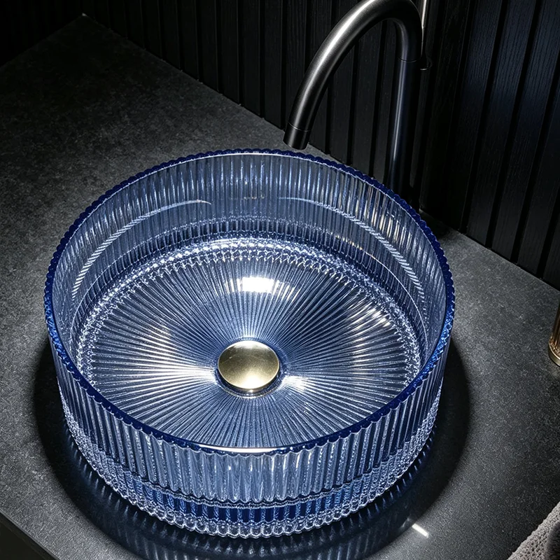 Aqua Blue Glass Countertop Basin, with a Simple and Elegant Round Design, the Light Passes through the Basin Body, Reflecting Dynamic Light and Shadow, Creating a Rich Atmosphere. the Three-Dimensional Straight-Line Design Enhances the Light and Shadow Layers, Making It an Ideal Choice for Modern Bathroom Fixtures, Suitable for Dressing Rooms, Vanity Tables, and Home Bathroom Sinks, and Can Be Matched with Various Decor Styles (Accessories Not Included)