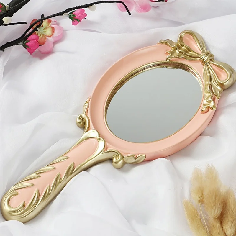 

Vintage Princess Pink Makeup Mirror White Beauty Salon Baroque Bow Handheld Mirror Blue Portable Resin Mirror for Gift HomeDecor