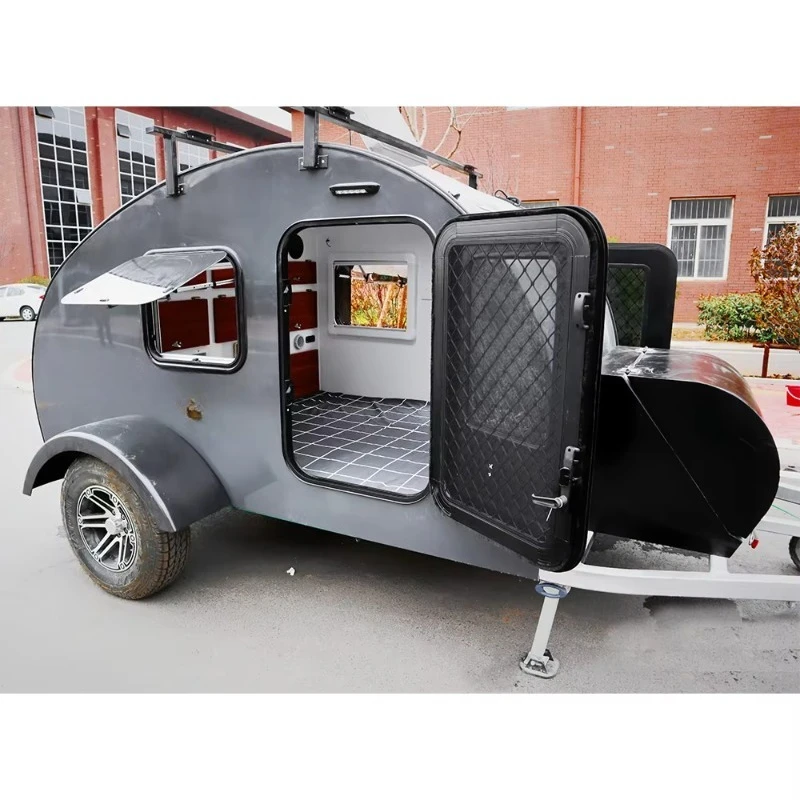 Teardrop Shaped Mini RV Trailer Off Road Capable Fuel Saving Mesh Security Door Roof Rack For Mountain Expedition Road Trip